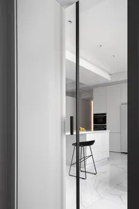 Modern kitchen interior with marble flooring and minimalist design