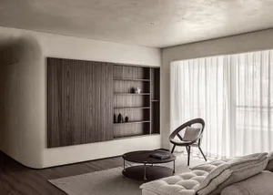 A minimalist living room featuring wooden furniture, glass accents, and a comfortable seating area.