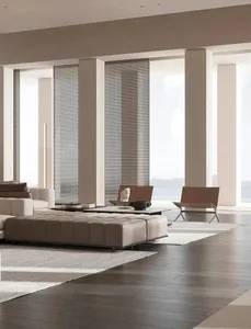 Modern minimalistic living room featuring a combination of wood, leather, and metal furniture.