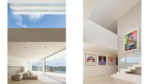 Modern minimalistic interior design showcasing concrete, glass, and stone materials in a luxurious residential space