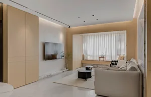 A minimalist living room with wood paneling, a white sofa, and a large window