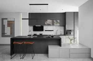 Modern kitchen featuring marble countertops and minimalist design