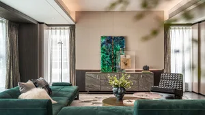 Modern living room with marble accents and stainless steel furniture