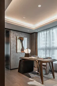 Modern home office featuring a wooden desk with a minimalist design.