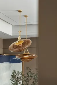 Modern interior design featuring glass lighting fixtures.
