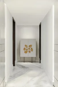 Modern interior design featuring a white marble corridor with a cabinet adorned with agate rocks.