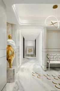 Modern minimalist corridor with marble details and abstract lighting fixture
