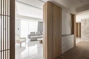 Modern living room featuring wood, marble, and concrete materials.