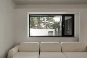 White fabric sofa in a modern living room.