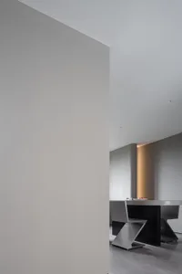 Modern interior design featuring metal furniture and materials.