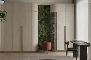A modern bedroom with wooden cabinets, greenery, and a desk.