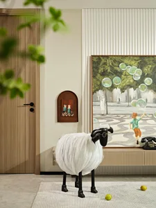 Modern living room featuring a wooden floor and black and white sheep with glasses action