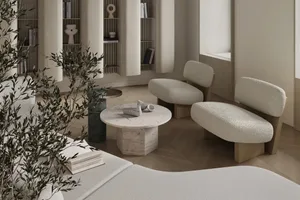 Modern minimalist living room featuring textured cotton fabric furniture and neutral color palette.