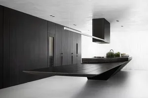Modern kitchen featuring dark wood cabinets and a sleek, floating island.