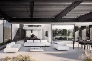 A modern living room with minimalist design and concrete features.