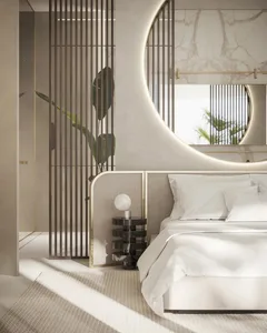 A minimalist bedroom featuring a metal headboard, marble accent wall, and fabric upholstered bed.