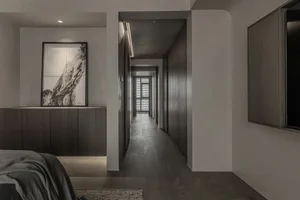 Modern interior design featuring taupe colored walls and oak wooden floors.