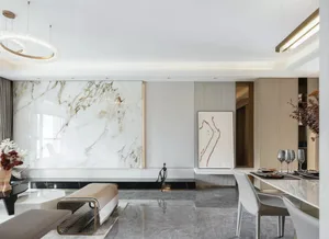 Modern minimalist living room featuring marble textured walls and concrete floor.