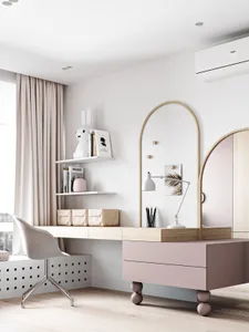 A minimalist home office featuring a white wooden desk with a white fabric chair and a modern lamp.