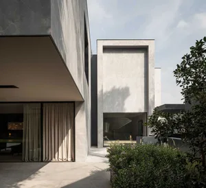 Modern house with concrete exterior and large windows