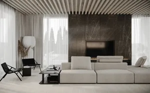 A modern living room with concrete and marble materials.