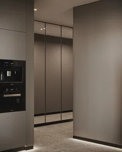 Modern metallic kitchen with sleek, minimalist design.
