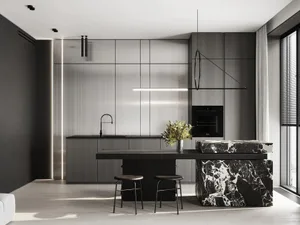 Modern minimalist kitchen featuring a kitchen island with black marble countertops and black stools.