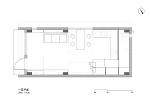 A floor plan of a modern apartment showing the layout of the living room, kitchen, bathroom, and bedroom.