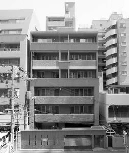 A modern apartment building constructed with brick material.