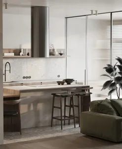 Modern minimalist kitchen with terrazzo flooring, white countertops, and wooden accents.
