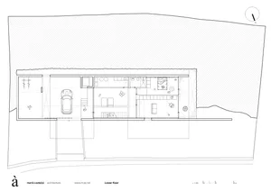 Floor plan of a modern house with glass, metal, and concrete architectural materials.