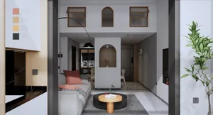 Modern living room with gray furniture, a round coffee table, and a cozy seating arrangement.