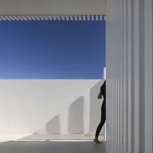 A minimalist terrace made of concrete.