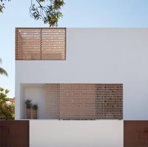 Modern exterior of a building with a wooden screen