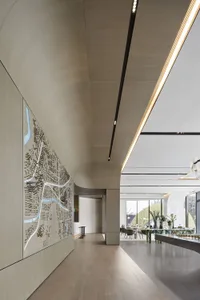 Contemporary office interior with exposed concrete and glass elements