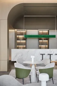 A modern bar lounge with marble finishes and a sleek, contemporary design.