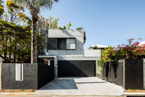 Modern minimalist house with concrete and glass exterior