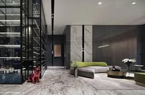 Modern living room featuring luxurious marble finishes and minimalist design elements.