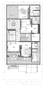 Floor plan of a modern house with various rooms including living room, kitchen, bedrooms, and bathrooms.