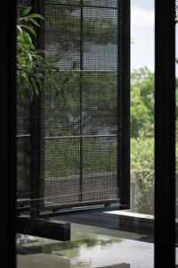 Metallic interior design with a grid-like window