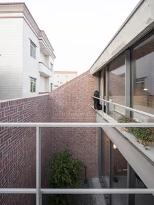 Modern architectural design featuring a brick interior space
