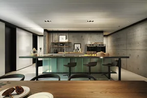 A modern, industrial-style kitchen featuring concrete walls, a black island, and minimalist design elements.