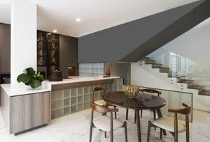 Modern kitchen with dining area and staircase