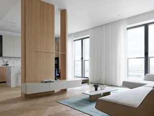 A modern minimalist living room with a marble coffee table, wooden floor, and large windows.