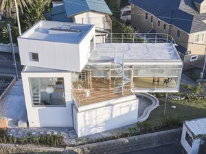 Modern white house with glass features