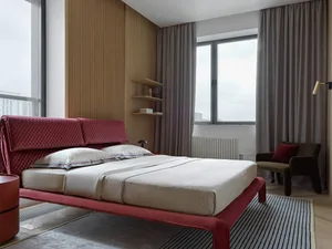 A modern minimalist bedroom with a red upholstered bed, wooden accents, and large windows.