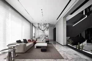 Modern minimalist living room with a gray marble floor and white furniture.