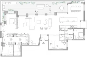 A detailed architectural blueprint of a modern building layout showing various rooms, spaces, and furniture arrangements.