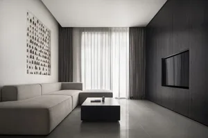 Modern minimalist living room featuring metallic accents, glass windows, and upholstered furniture.