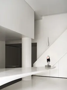 A modern white interior design featuring minimalist aesthetics and clean lines.